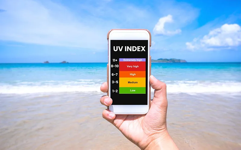 tanning outdoors under moderate UV conditions