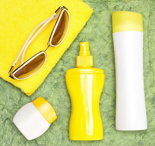 safe tanning with sunscreen under sunlight